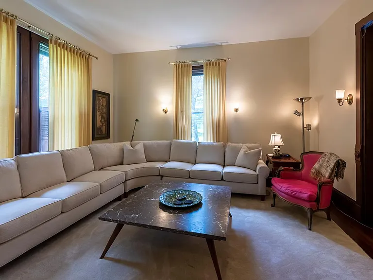 Living Room, with marble table and wrap around sofa