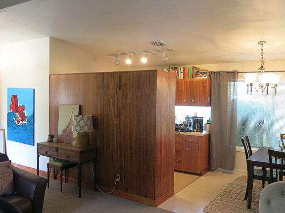 Living area looking into dining area and part of kitchen.