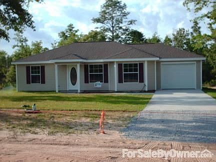 Fantastic Front of Home View! : Front of Home with Over-sized Windows, Yard, Garage, and Driveway!