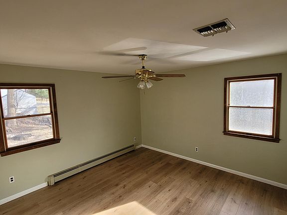 Master bedroom with walk-in closet. New laminate floor and repainted.