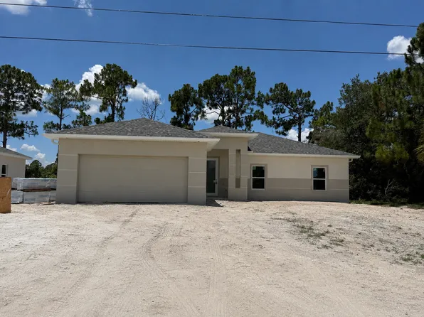 728 Carbon St E, Lehigh Acres, FL 33974