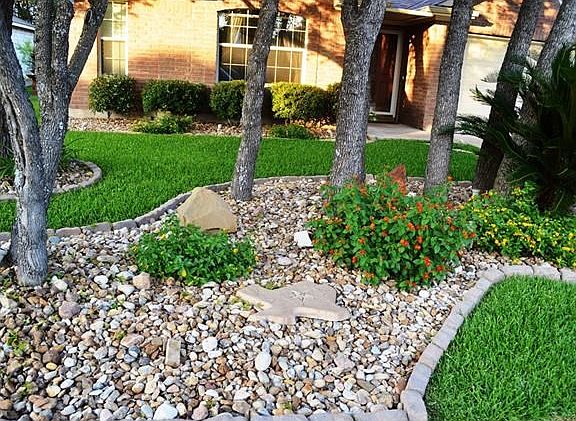 Beautifully landscaped front lawn.