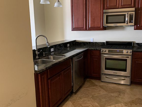 Stainless appliances included in each rental; gas stove, microwave, dishwasher, refrigerator/freeze