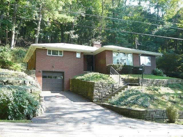Well maintained brick ranch on over an acre of mature landscaping. Great light flows into this property.