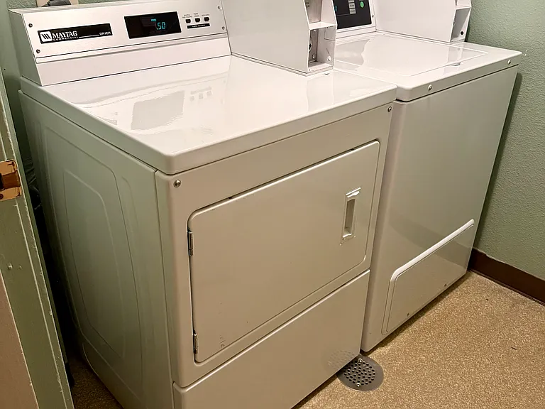 Washer & Dryer are next door in the hallway and shared by the 8 units on the floor. There are similar set up on every floor so waiting is never an issue.