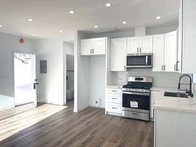 6427 Rhodes Ave — Photo 49