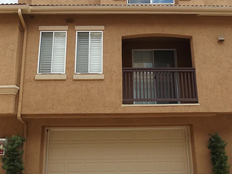 Rear view of the entire townhouse from the drive aisle
