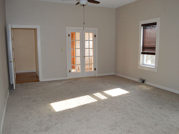 Living room w/entry doors