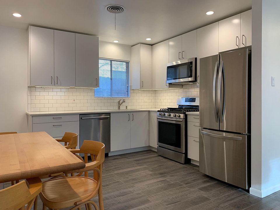 New kitchen (2018), quartz counter, tile backsplash, new appliances (DW, fridge, disposal, range, microwave)