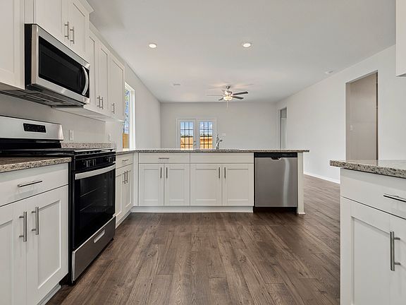 You will find abundant storage options and natural light in this beautiful home.