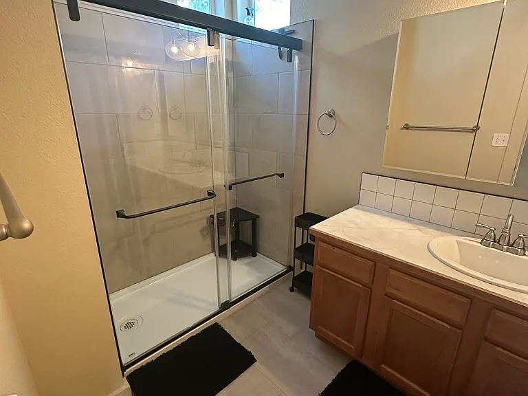 Master Bathroom (recently re-done) Stand in shower with private toilet room