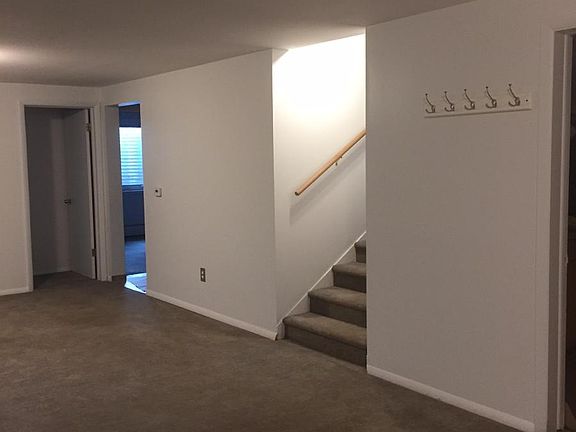 Living Room and Stairs to Outside