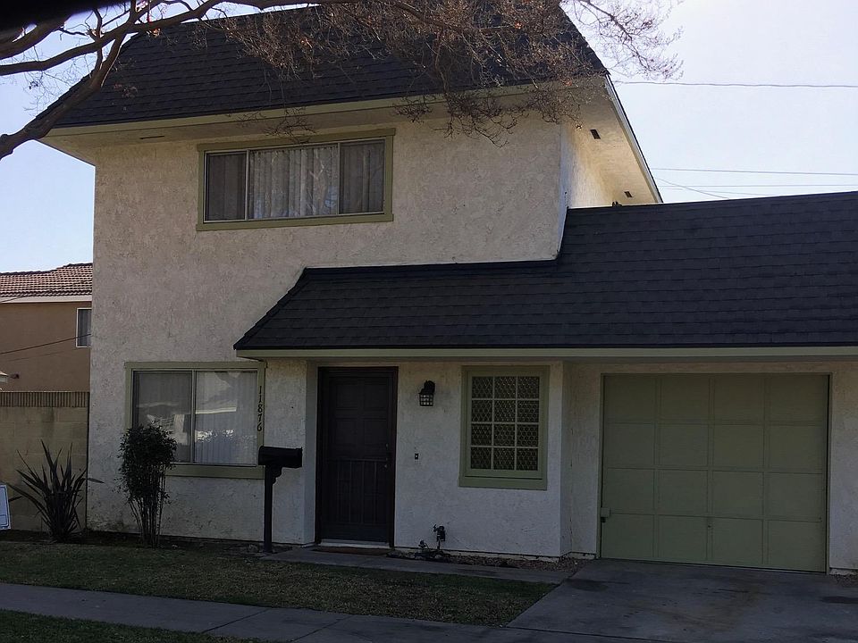 Two-Story 2 Bedroom 1.5 Bath home with private yard and garage.