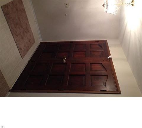 Spacious entry foyer features double doors.  Both open for added convenience!