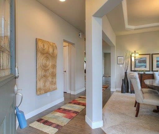 Beautiful entry with handscraped hardwoods. 