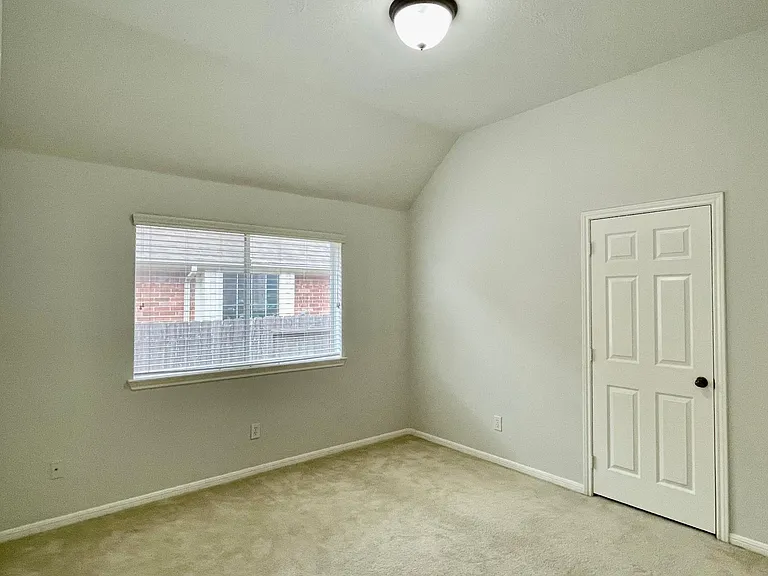 Spacious secondary bedroom with ample closet space