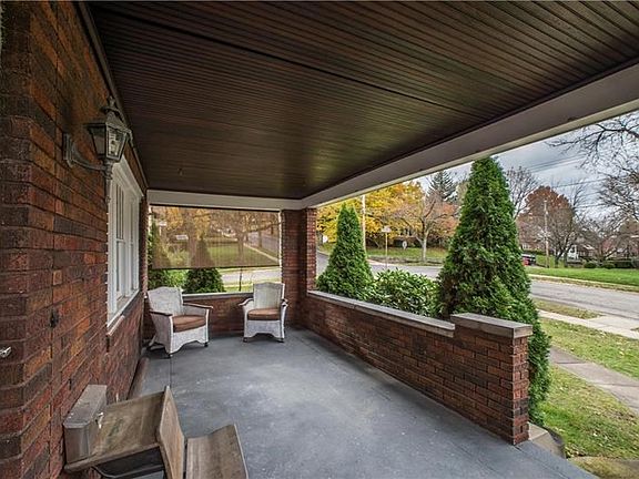 This large front porch is the perfect spot to spend warm summer evenings!