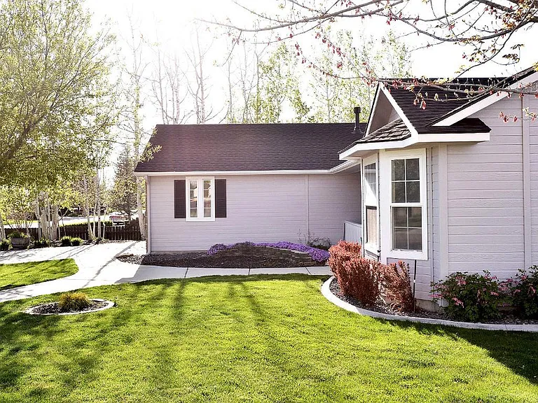 fully landscaped & surrounded by mature trees