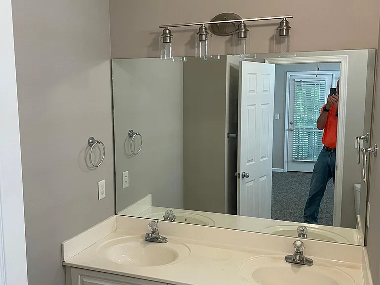 Dual vanity in Master Bath with vaulted ceiling.