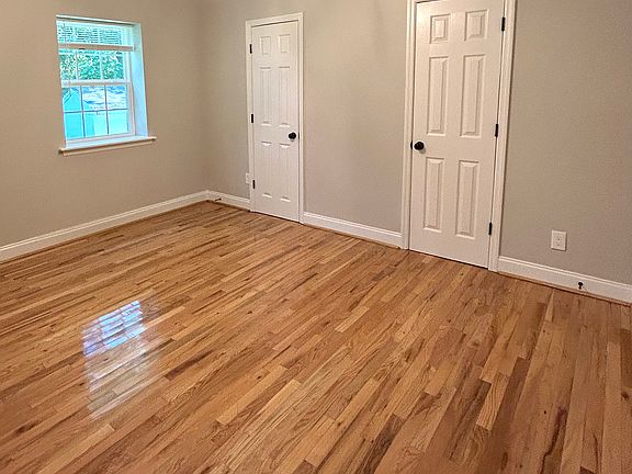 Master Bedroom:
New Windows and Light Fixtures; Refinished Hardwood, His/Her Closets