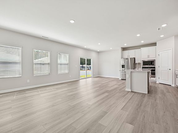 Great room in the Chatham floorplan at a Meritage Homes community in Garner, NC.