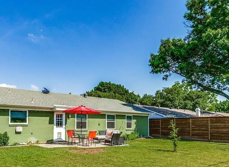 huge backyard with high privacy fence