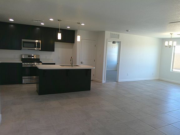 4th image of 11239 E 42nd Pl