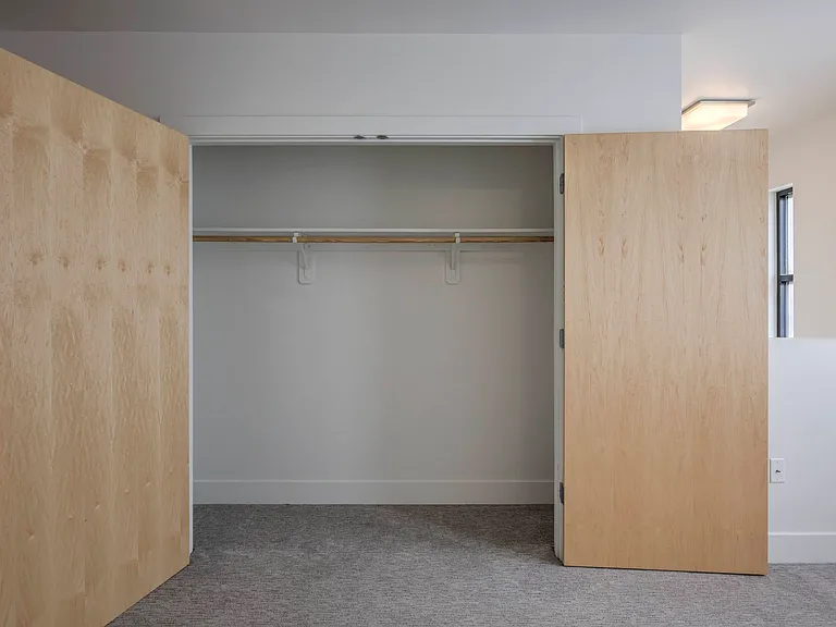 Large closet with rack at The Sawyer.