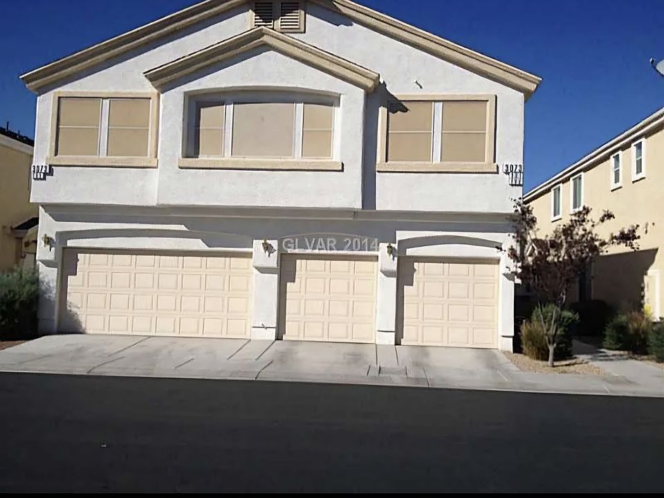 Middle garage is for unit 102