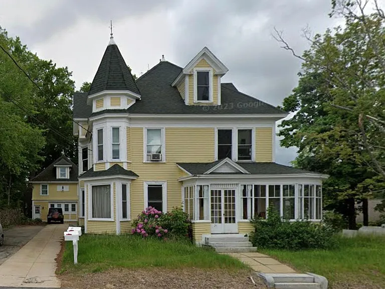 Main house, community sun porch overlooking main st and historic church.