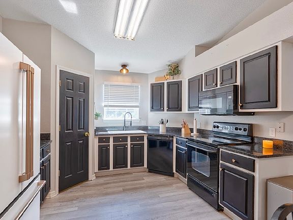KITCHEN, GRANITE COUNTERTOPS, CAFE FRIDGE, NEW MICROWAVE AND NEW OVEN, FARMHOUSE SINK