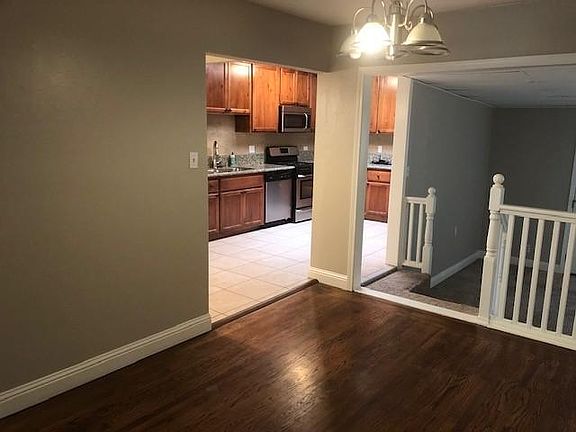 Living Room Dining Area to Kitchen and Family Room