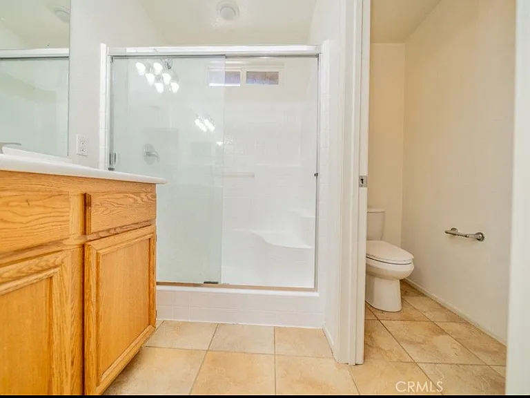 This picture shows the Master bathroom. There are two full bathrooms upstairs (the master bathroom and the hall bathroom) and a half bathroom downstairs.