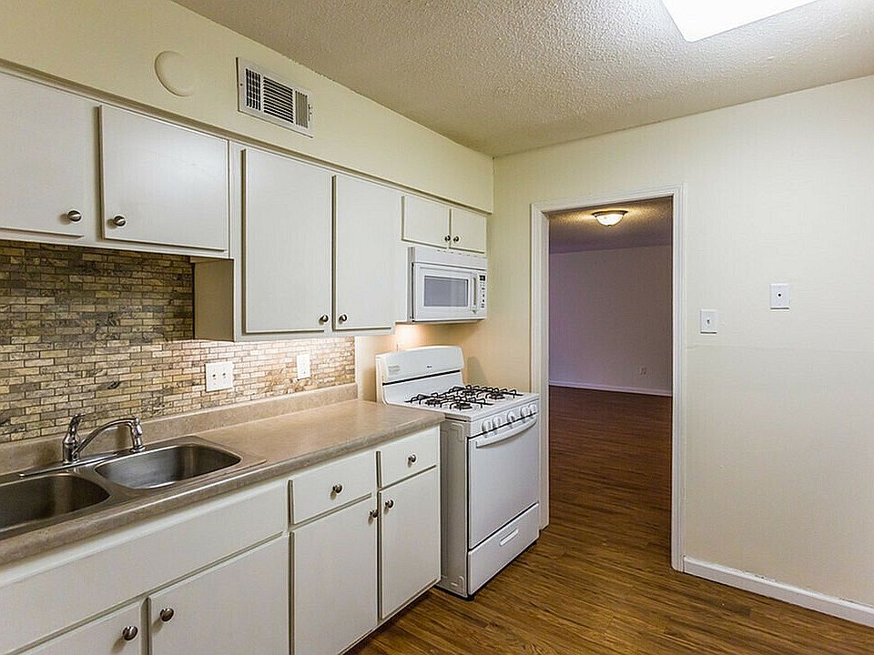 Step into a kitchen that combines modern design with functional elegance.
