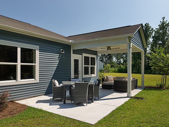 Enjoy meals with friends on the concrete Patio