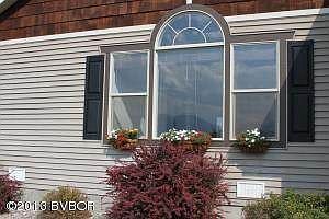 OUT SIDE OF LIVING ROOM WINDOW  448