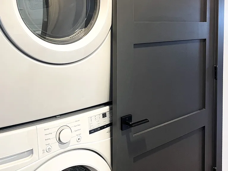 Unit comes with stacked washer and dryer