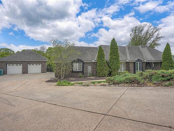 4th image of 6101 NW Saddle Club Ct
