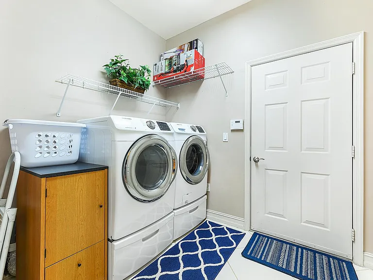 Laundry room with exit to garage