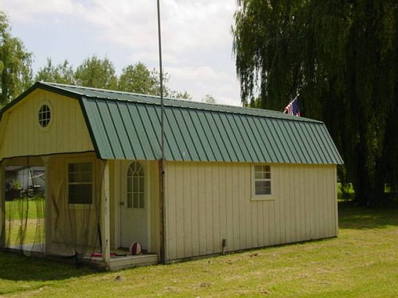 Here is the high quality Amish built shed with porch and steel roof!