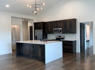 103 W Pine St, Raymore, MO 64083