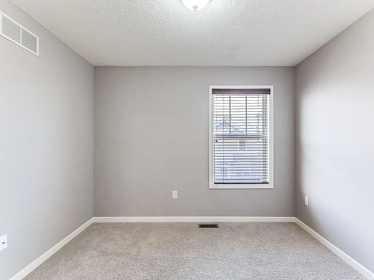 8974 SW Village Loop — Photo 14