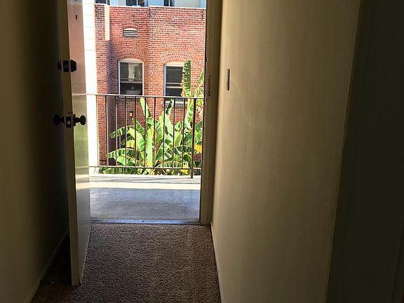entry hall and doorwar overlooking courtyard--3rd floor