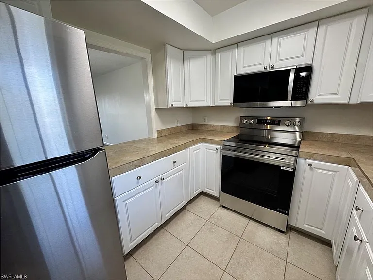 5667 Rattlesnake Hamm Rd N #B-301 — Photo 5