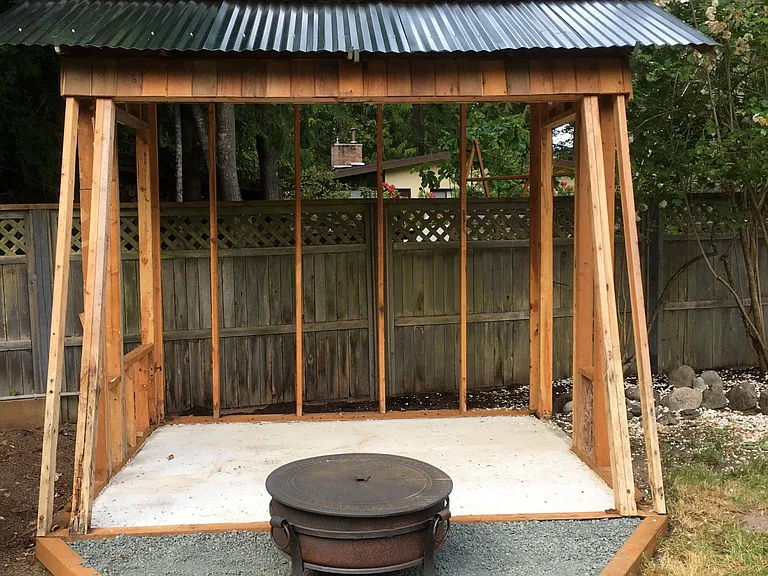 BBQ/Grill area with dedicated electric and spot for portable fire pit ( portable fire pit shown not included )