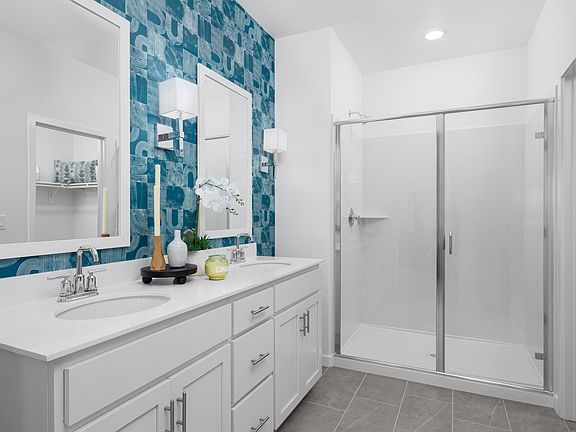 Primary bath with glass shower enclosure