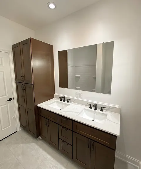 Recently updated bathroom with double sink and lots of storage