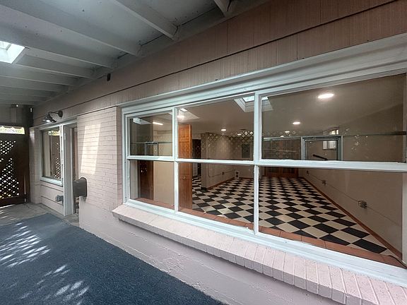 Living room windows from covered patio.
