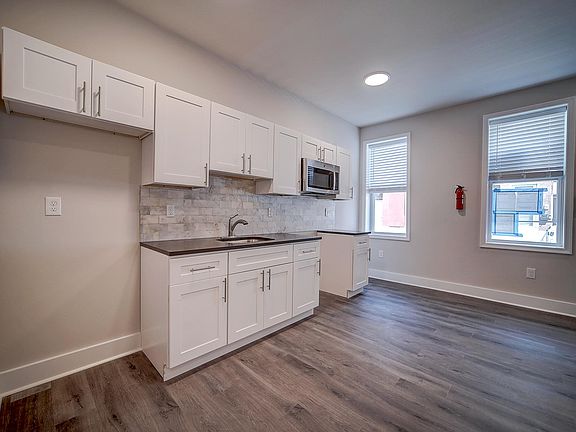 Kitchen includes stove and Fridge