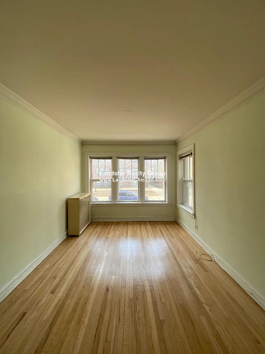 Building Photo - 5023 N Winchester Ave #2
